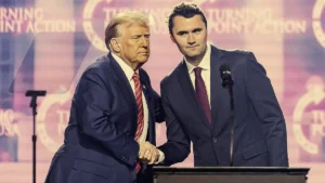 Crowd at Charlie Kirk Memorial with President Trump addressing attendees amid Trump Lawsuit on immigration and Palestine Recognition diplomatic shifts.