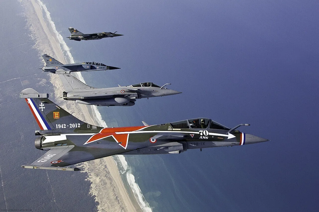 Top 10 Largest Air Forces in the World 2025: Full Ranking 11 French Air & Space Force aircraft flying over the sea